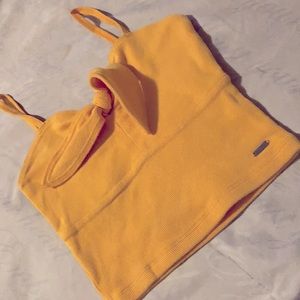 Beautiful  Crop top with a cute bow and with it cute orange Color size  10,11